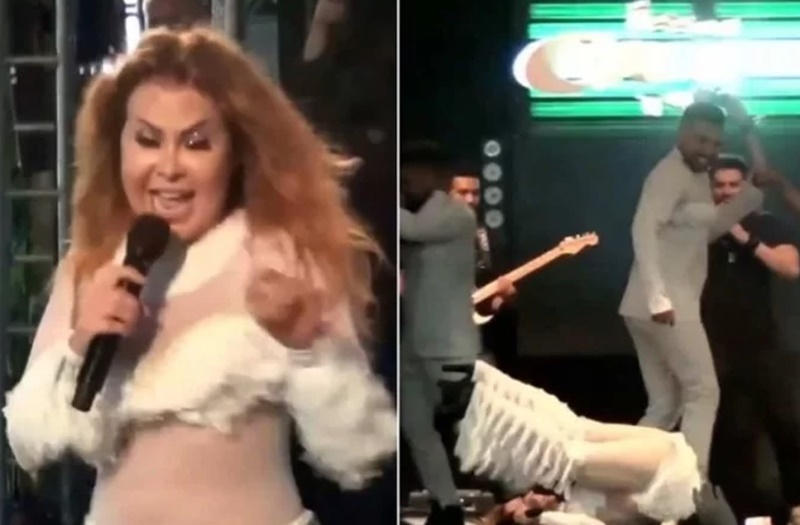 Cantora Joelma escorrega durante coreografia e leva tombo em show