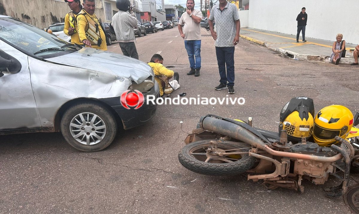 VÍDEO: Mototaxista e passageira ficam feridos em acidente na frente do Banco do Brasil